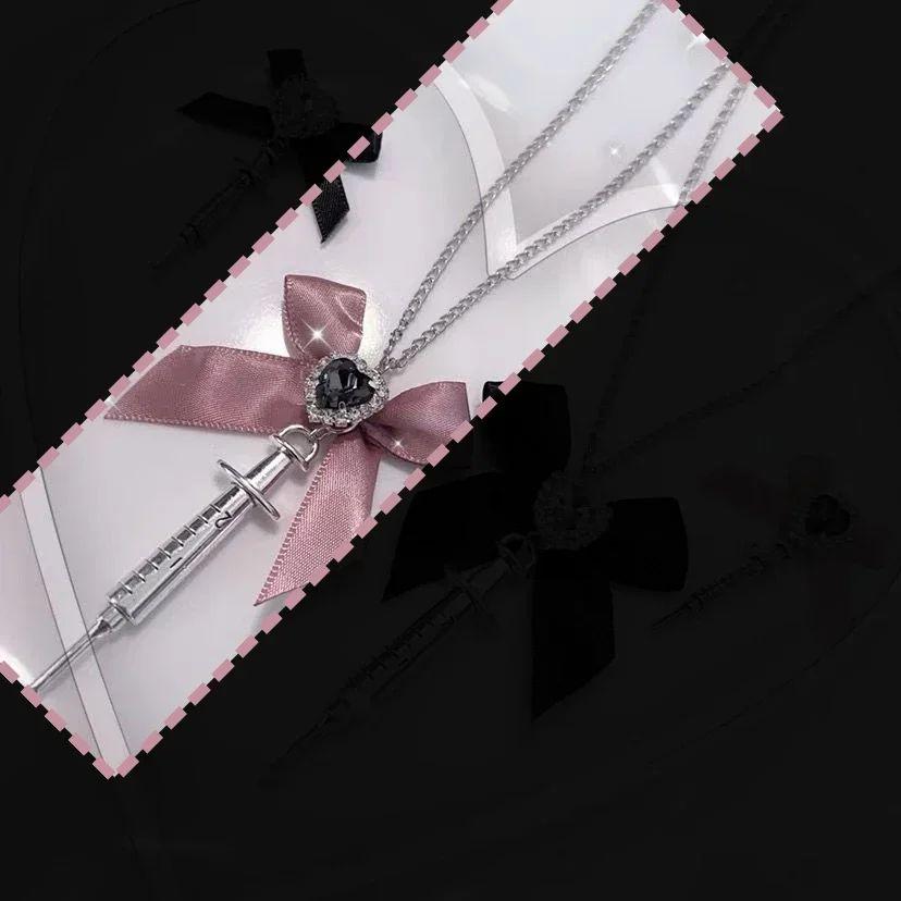 

New Love Heart Bowknot Metal Syringe Pendant Necklace for Women Dark Lolita Cool Trend Jewelry Gothic Fashion Accessories