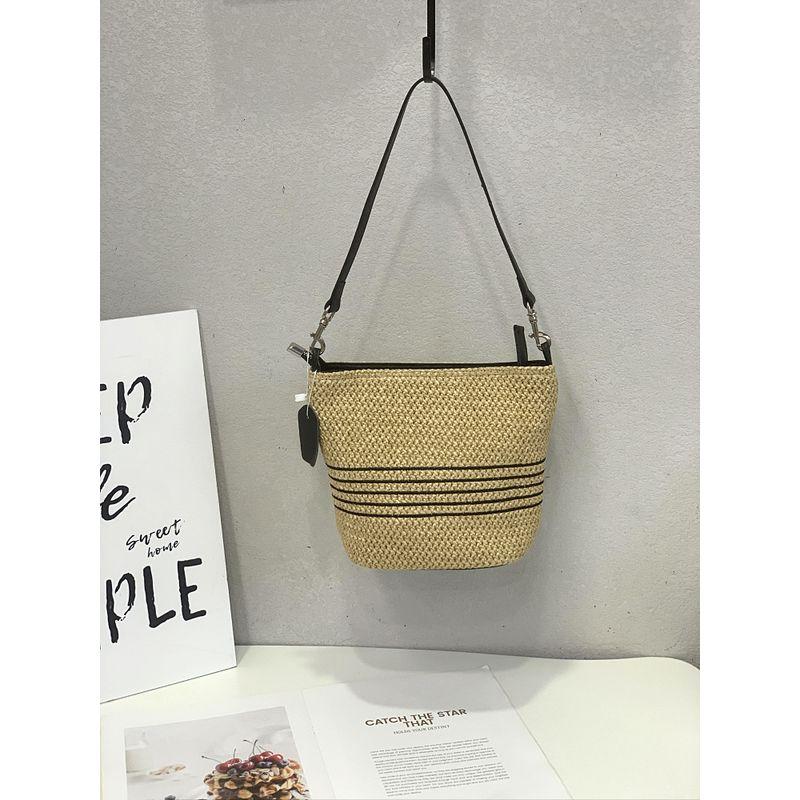 

2025 New Summer Straw Bag Contrast Color Stripe Holiday Seaside Beach Bag Casual All-matching Shoulder Bucket Bag Straw bucket with top layer cowhide