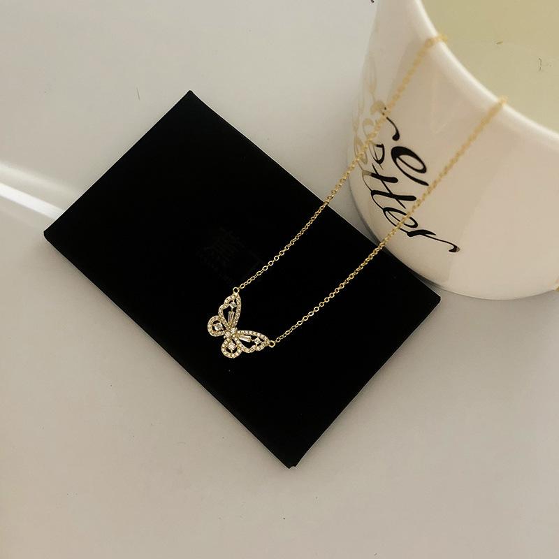 Japan and Korea necklace Mori temperament smart hollow butterfly pendant female micro zircon fashion design collarbone chain wholesale