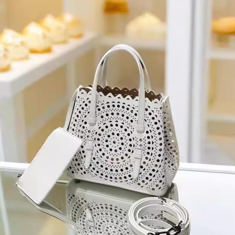 Trendy Carved Calfskin Handbag with Long Crossbody Strap