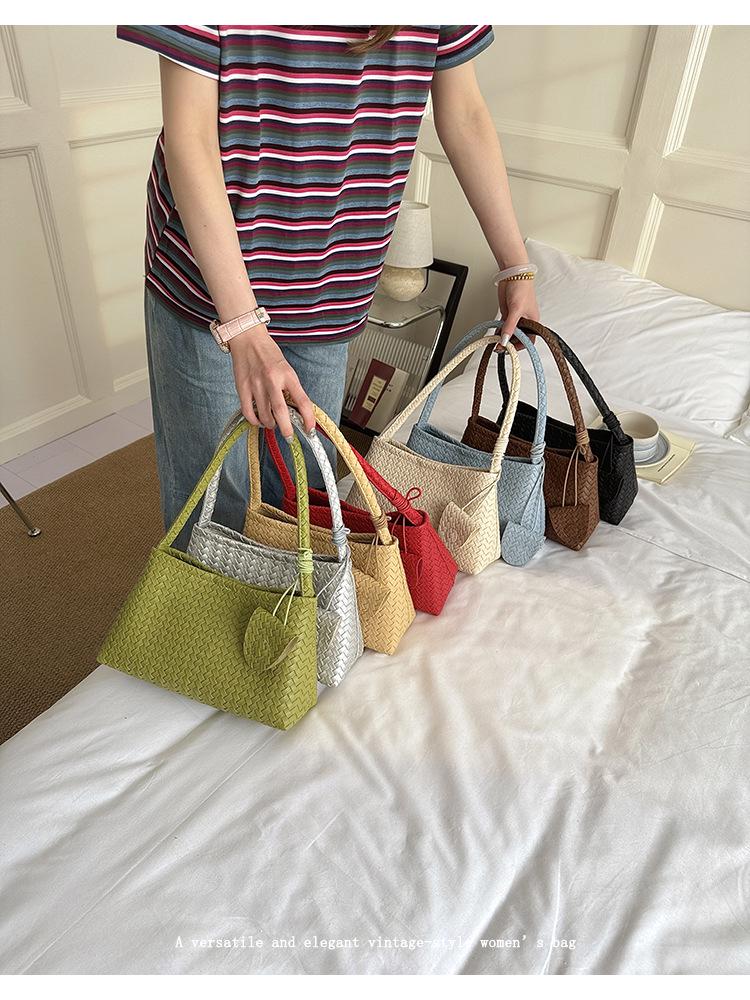 Elegant French Woven Pattern Baguette Women's Shoulder Bag 2026