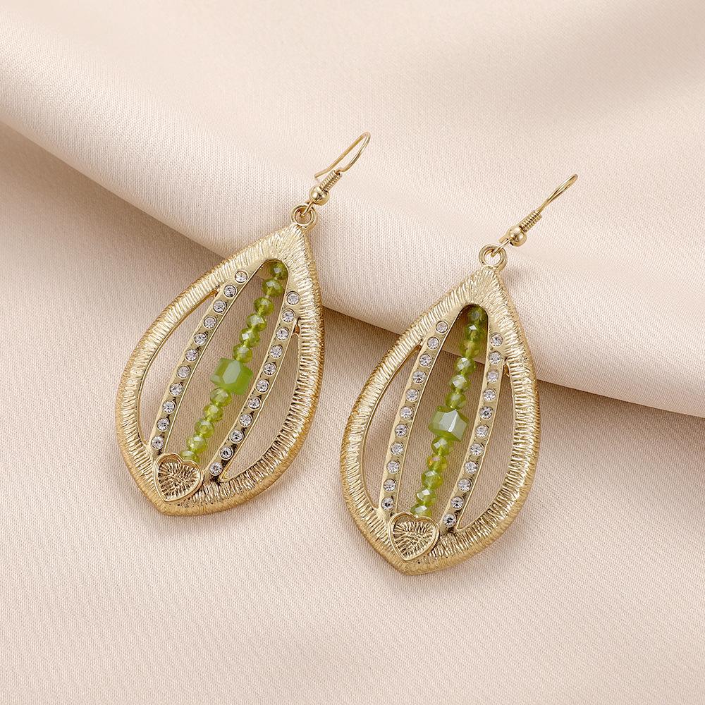 

Hollow Alloy Diamond Inlaid Beaded Teardrop Earrings for Women