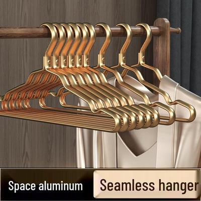 Cintre en alliage d'aluminium haut de gamme doré pour un usage domestique