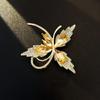 Elegant Rhinestone Animal Brooch: High-End Flower Design for Women's Coats and Accessories