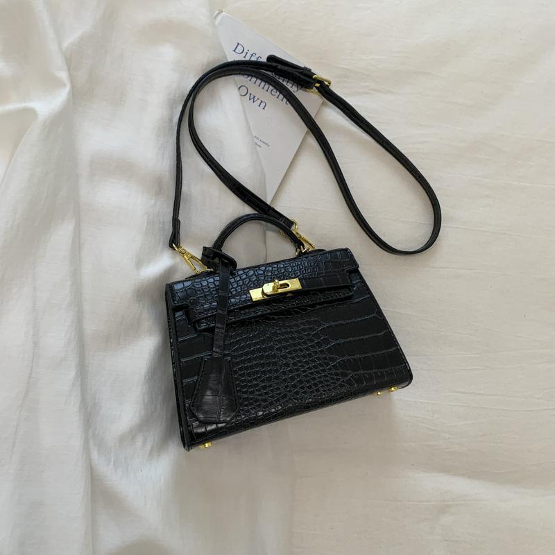 Korean version of fashionable niche stone pattern bag 2025 autumn new texture handbag retro fashion messenger bag bag