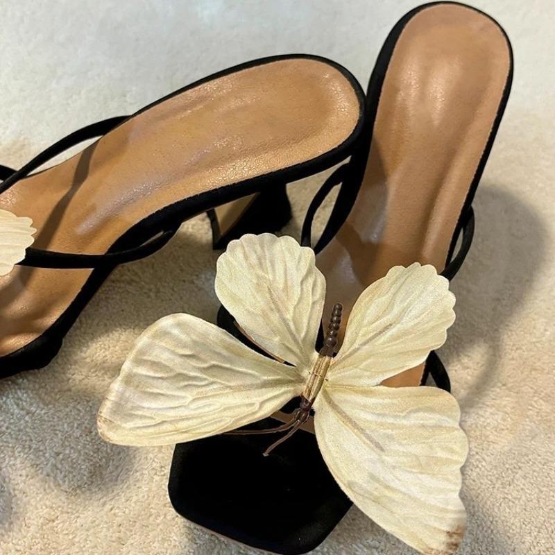 Leder Französisches Nischen-Temperament Schmetterling Ein-Riemen-Slipper Damen Neue Frühling und Sommer Dicke Sohle Hoher Absatz Sandalen