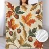 A Cozy Autumn Leaves And Pine Nuts Fleece Blanket with a Vintage Pattern, Perfect for Dorms And Offices for Napping. This Printe