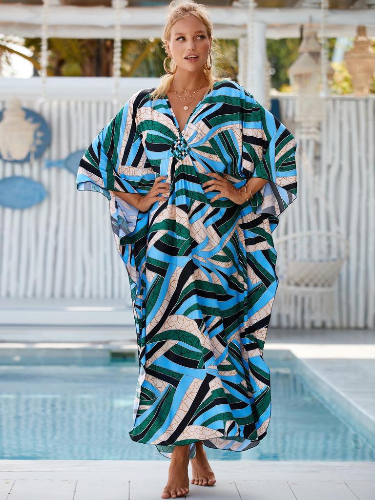 Vestido de Playa Holgado Estilo Europeo y Americano: Sobrecamisa de Talla Grande para Protección Solar y Vacaciones en la Playa