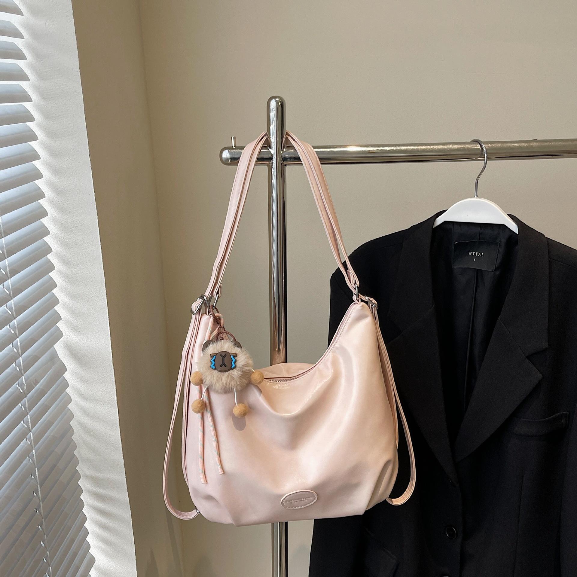 

2025 new high-end retro soft leather tote bag trendy casual student class commute large capacity backpack розовый