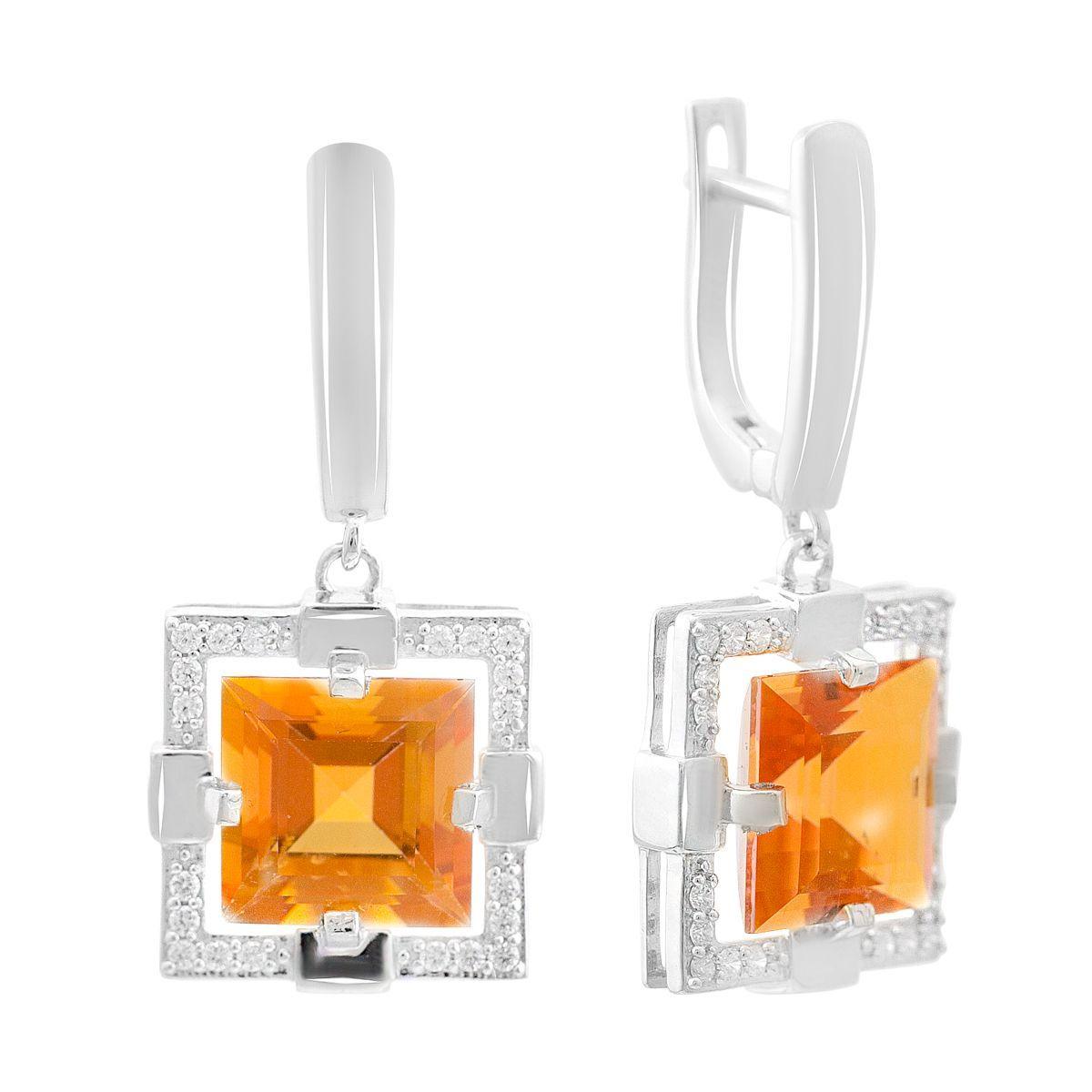 

Срібні сережки з блакитним кварцом 9.713ct (2165736) бурштин