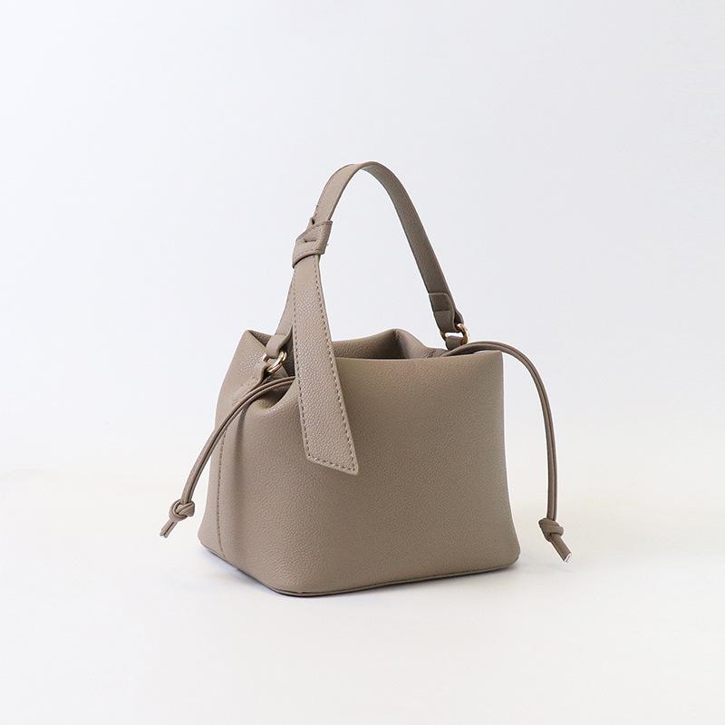 

Spring and summer new women s fashion handbag versatile messenger bucket bag simple large-capacity commuter shoulder handbag хаки