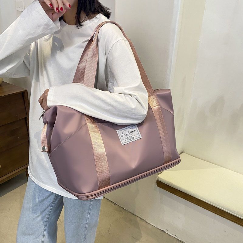 

Large-capacity travel bag Women s lightweight portable boarding bag Students can put on trolley case Luggage bag Storage bag