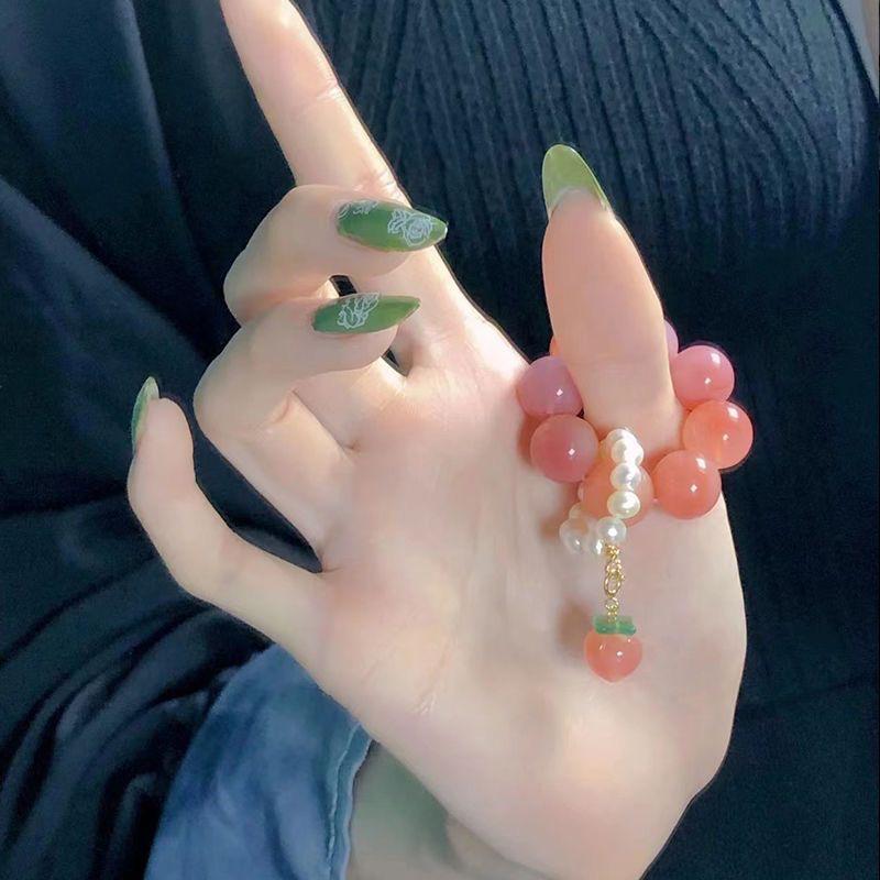 

Браслет из мягких розовых кристаллов в стиле Xiaohongshu - Студенческая версия