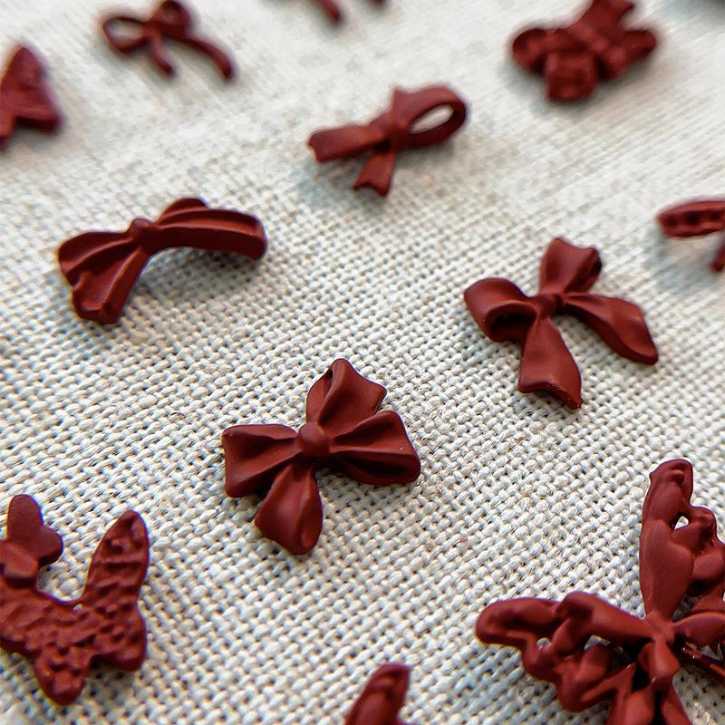 50Pcs Wine Red Resin Bow Nail Charm Bulk Mix Size 3D Ribbon Bowkont Mini Kawaii Nail Art Accessories Diy Cute Nails Decorations
