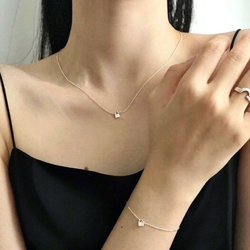 Mini padlock necklace with TONGCHE protection