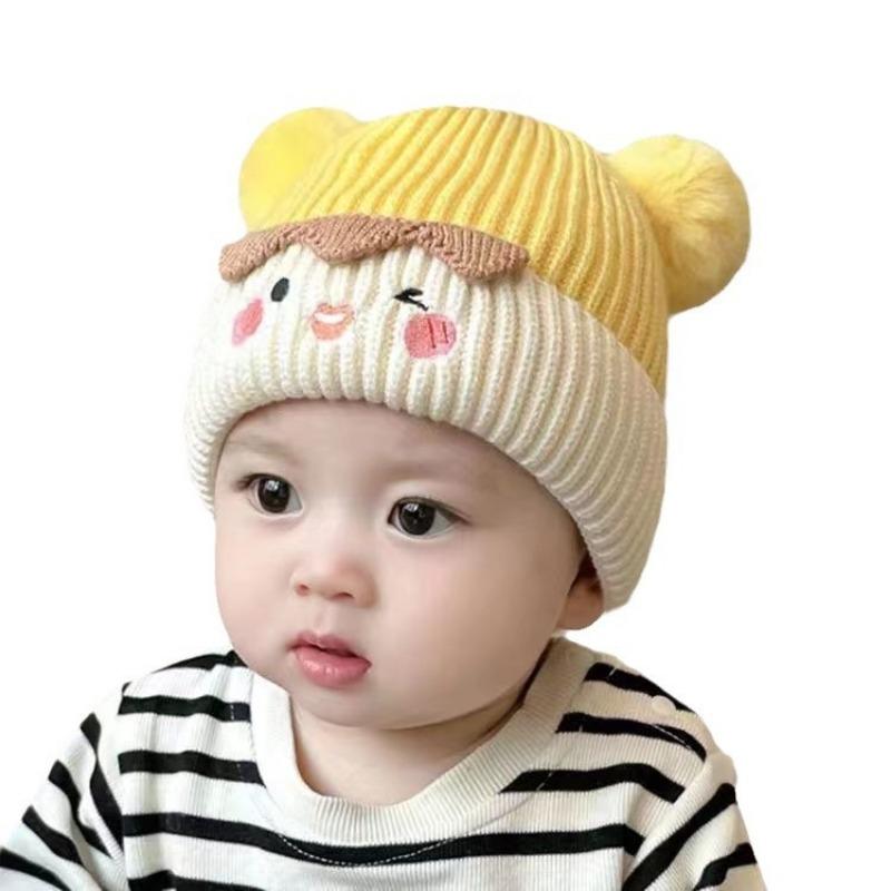 Baby autumn and winter cute cartoon warm hairball wool hat boys and girls baby ear protection hat children pullover knitted hat