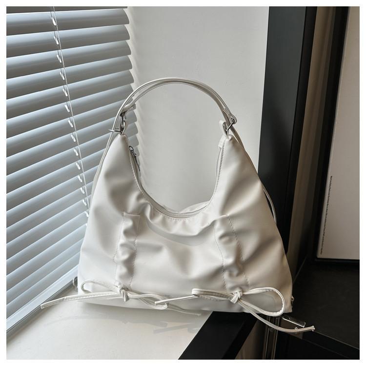 Modische Schmetterlingsschleife Große Kapazität Schultertasche 2024 Frühling Neuer Koreanischer Stil Street Trend Pu-Tragetasche