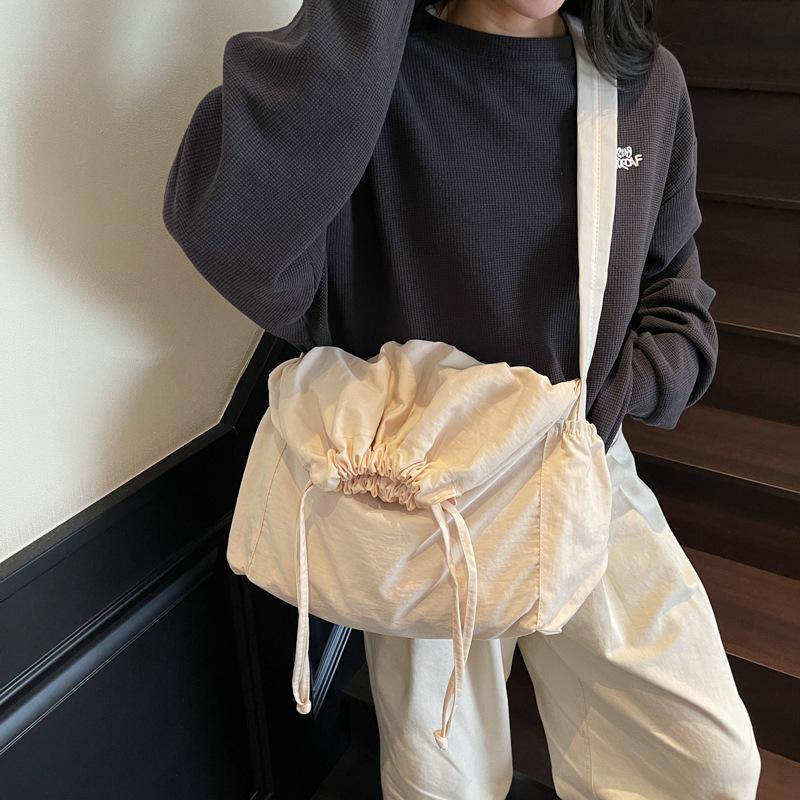 Large capacity drawstring nylon canvas bag women's new fashion bucket bag casual solid color shoulder messenger bag