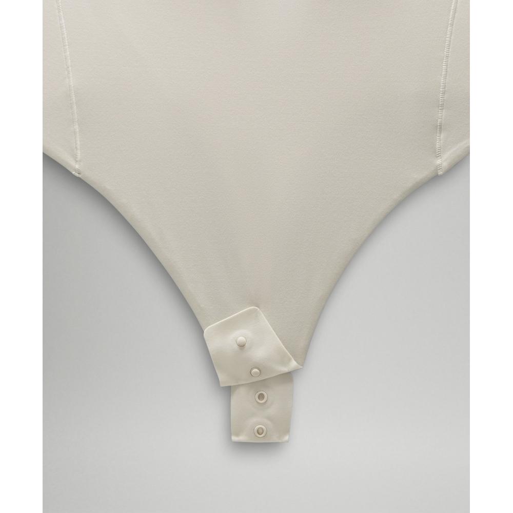 Lululemon Wundermost Ultra Soft Nulu Turtleneck Bodysuit Bone