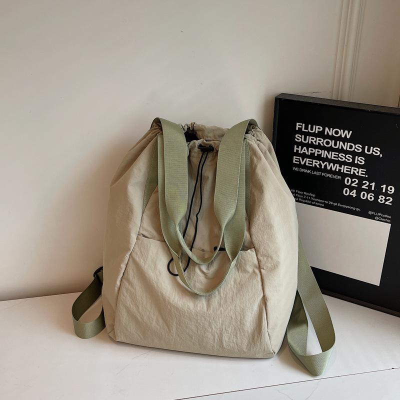 Schoolbag Fashion Drawstring Backpack Women's 1011 Spring New Simple Handheld Shoulder Bag Large Capacity Travel Backpack