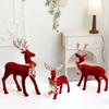 Glänzende Geweihe Weihnachts-Elch-Figur Beflockte Textur Glitzer-Schleife Hirsch Geschenk