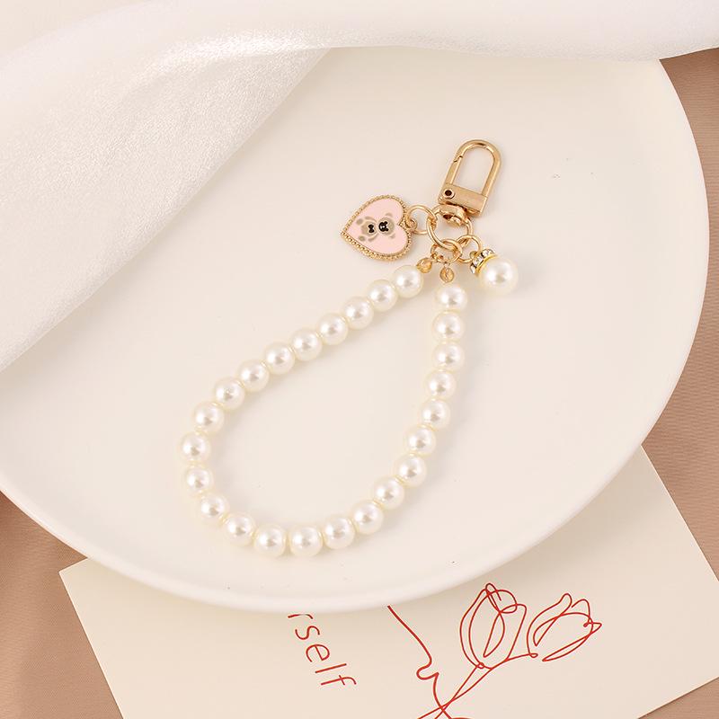 

Жемчужный автомобильный брелок из сплава с креативным шармом в виде медведя и сердца, аксессуар для сумок и чехлов для наушников