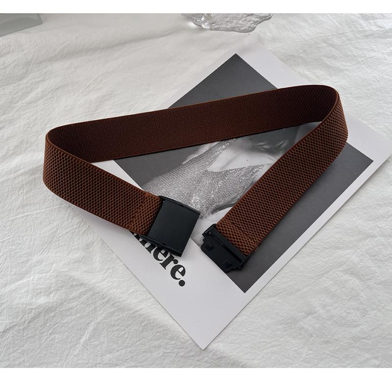 Elastic Versatile Waist Belt For Women Featuring Stylish Plastic Fastener In Elegant Black