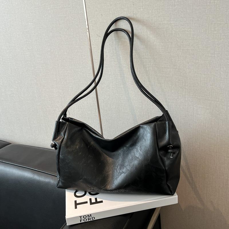 

Retro soft leather large-capacity tote bag women s 2025 autumn fashion simple leisure commuter shoulder bag underarm bag