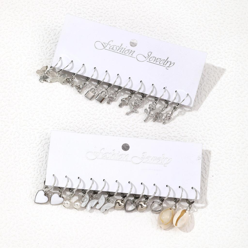 Hot-selling love pearl lock snake butterfly mushroom lock ear buckle creative personalized earrings earrings set pair