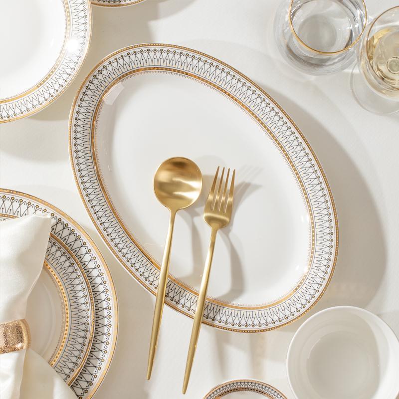 European Style Gold Rim Ceramic Dinnerware Set - Includes Large Bowls, Soup Bowls, Plates, and Rice Bowls for New Year Celebrations.