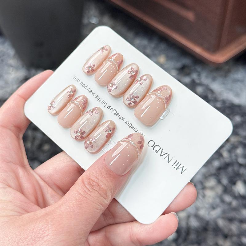 

Xiaohongshu Floral Cat-Eye Series: Elegant, High-End Whitening Handmade Nails