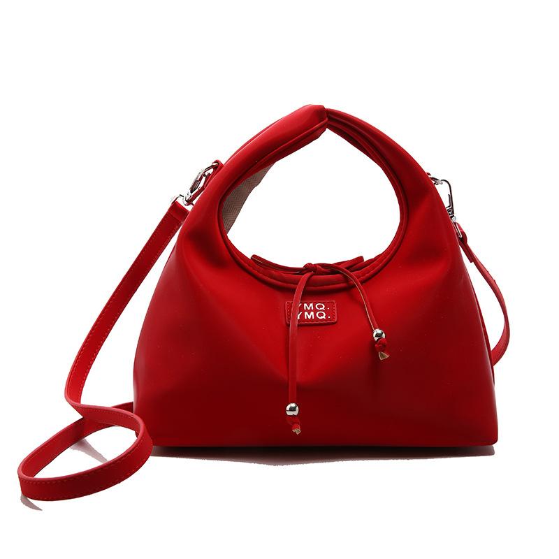 Korean version of casual versatile soft leather portable dumpling bag women's spring and summer popular small fresh simple wind light messenger bag