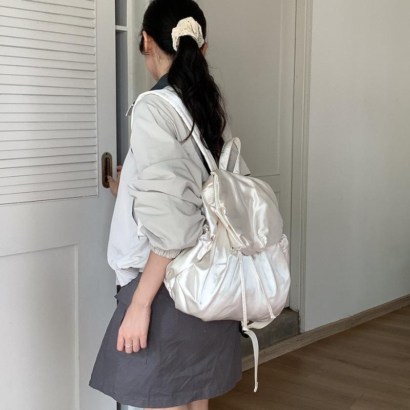 Wrought silk backpack women's large-capacity flip drawstring leisure new backpack backpack women's high-end travel schoolbag