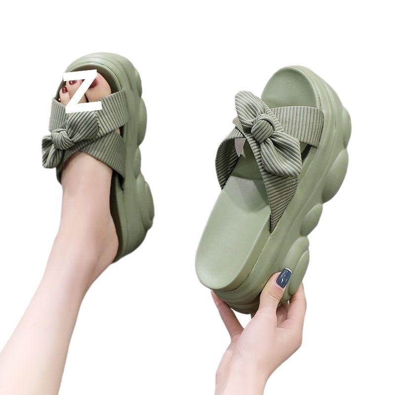 Thick-bottomed muffin slope heel slippers women's summer wear fashion bow cross versatile word sandals