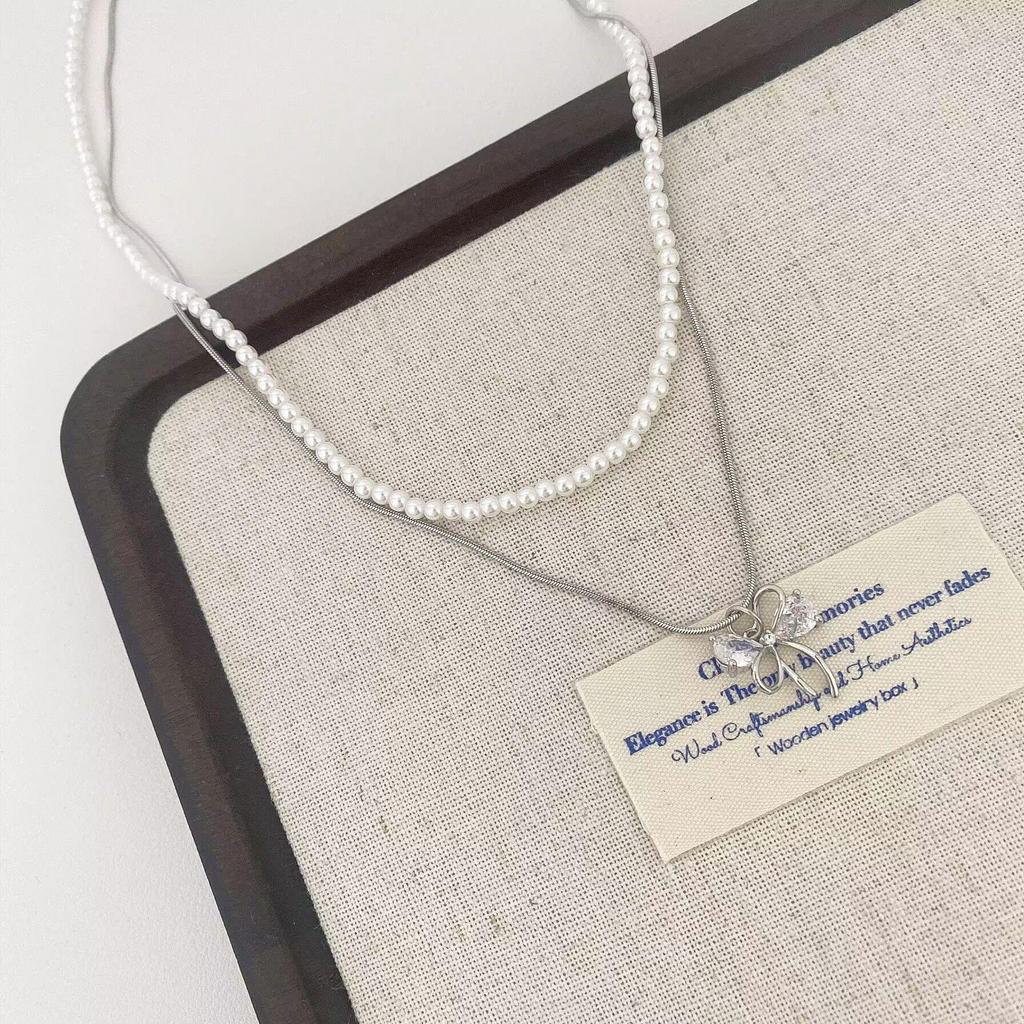 Elegant Double-Layer Pearl Bow Knot Necklace - Chic & Stylish Statement Clavicle Chain