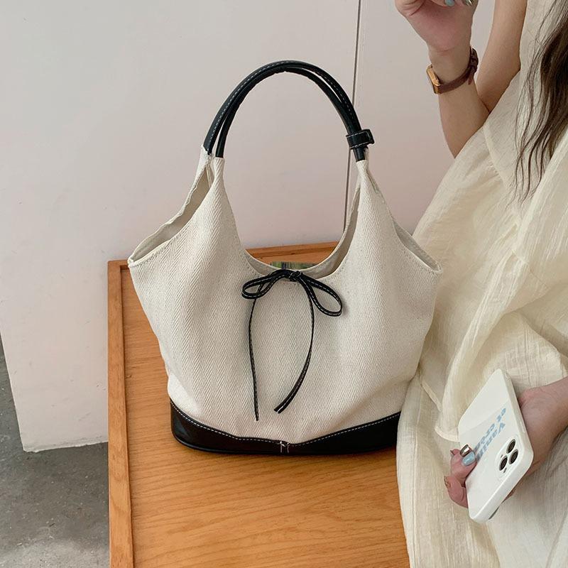 Niche Canvas Casual Tote Bag Women's New Commuter Fashion Handbag Versatile Shoulder Armpit Bag