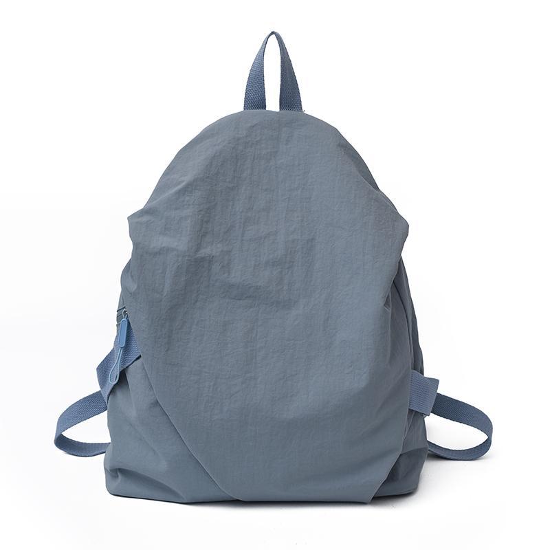 Schoolbag High-value backpack Women's simple solid color casual versatile backpack Light commuter travel bag Male college student schoolbag
