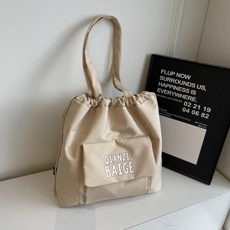 

Korean shoulder bag women s large capacity fashion sense college students class backpack girls leisure shopping commuter bucket bag хакі