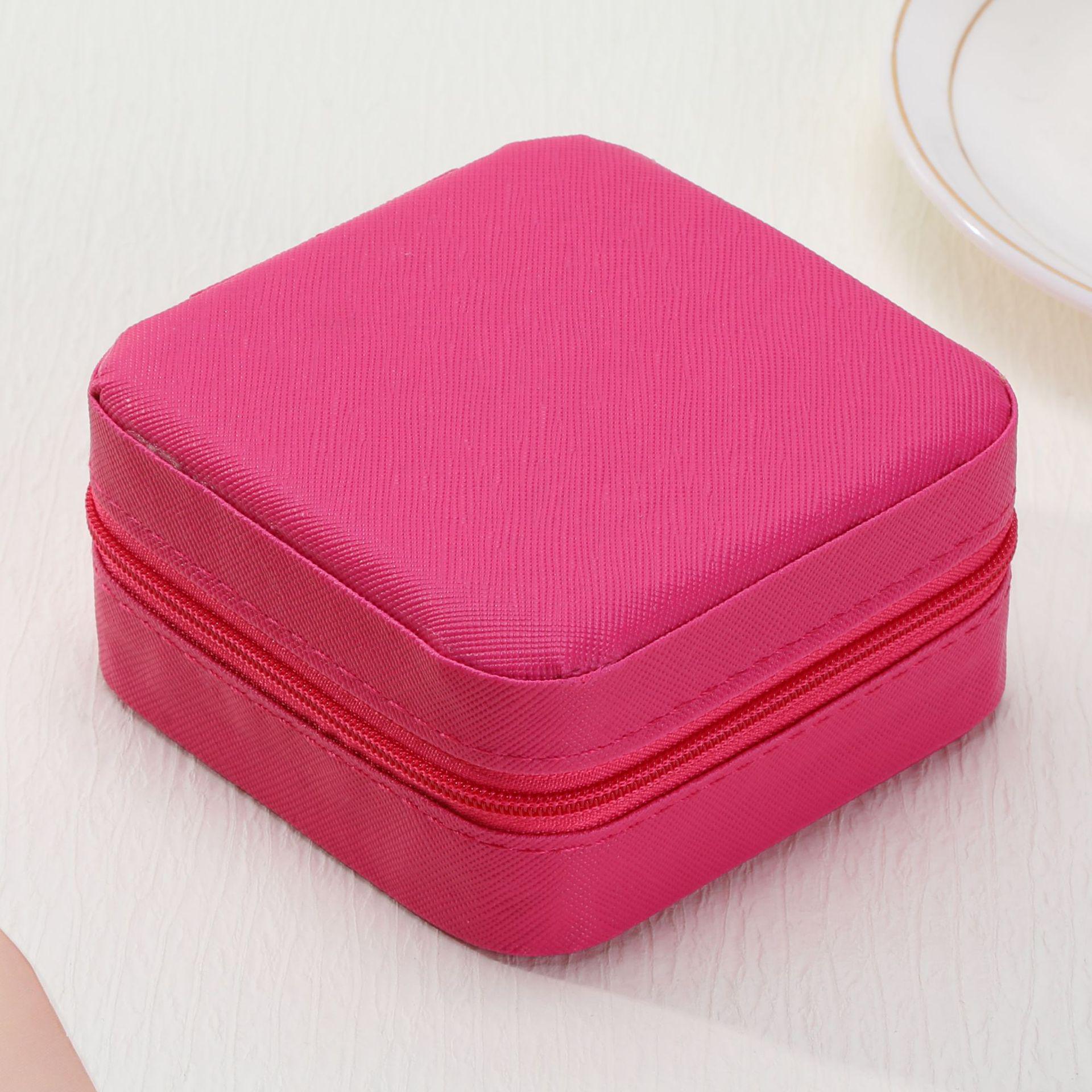 

Вишукана портативна скринька для зберігання прикрас для сережок, каблучок та кольє темно-рожевого кольору