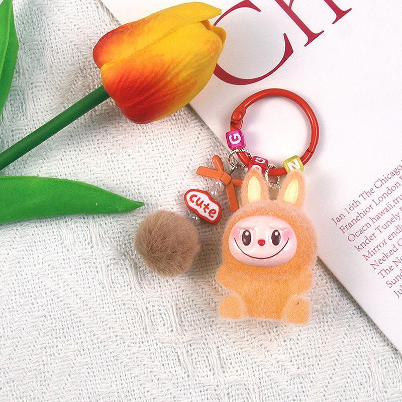 Luminous Flocking Sitting Cloth Doll Cute Grain Pendant Creative Cartoon Keychain Mobile Phone Chain Bag Pendant