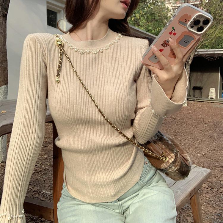 

Core-spun yarn, Korean beaded solid color horn-sleeved round neck women s winter knitted slim-fitting sweater One size