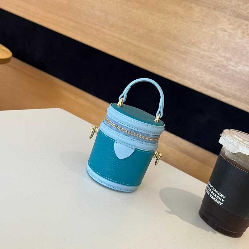 2026 new leather women's bag cylindrical vertical mini lunch box bucket bag chain earphone bag cosmetic bag cross-border batch