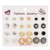 12 Pairs of Zircon Stud Earrings: Pearl, Flower & Bow Designs