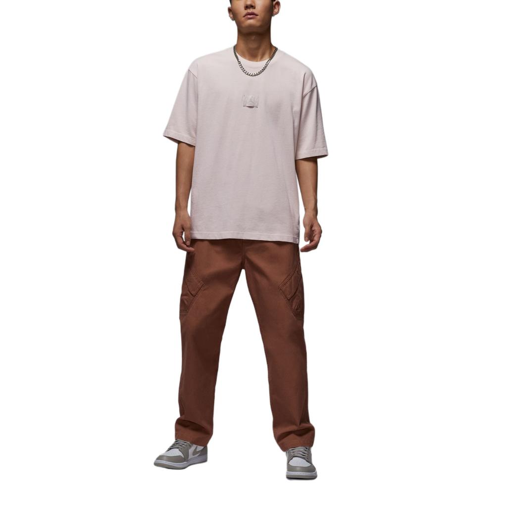 Jordan T-shirt da Viaggio Essenziale Comoda Girocollo Spalle Cadenti Manica Corta Uomo Top HQ8939104
