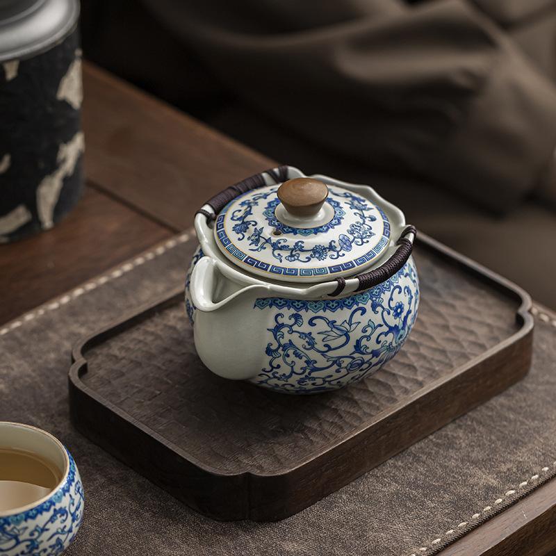 Beige Light Luxury Ru Kiln Twisted Branch Lotus Hand Grab Single Pot Teacup Kung Fu Tea Set Household Large-Capacity High-Grade Blue And White