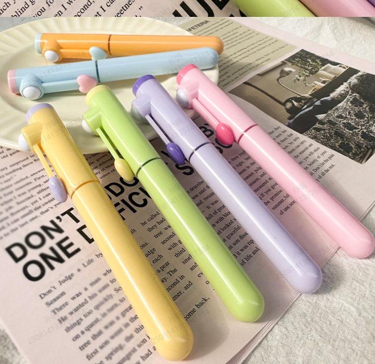 

Adorable Heart-Shaped Twist Highlighter Pen for Journaling & Student Use, Soft Tip for Smooth Highlighting.