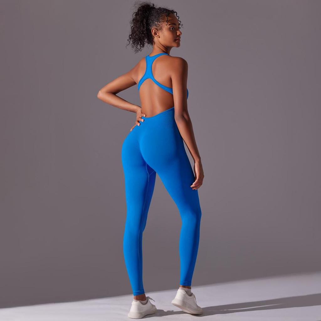 Sömlös enfärgad yogajumpsuit med öppen rygg