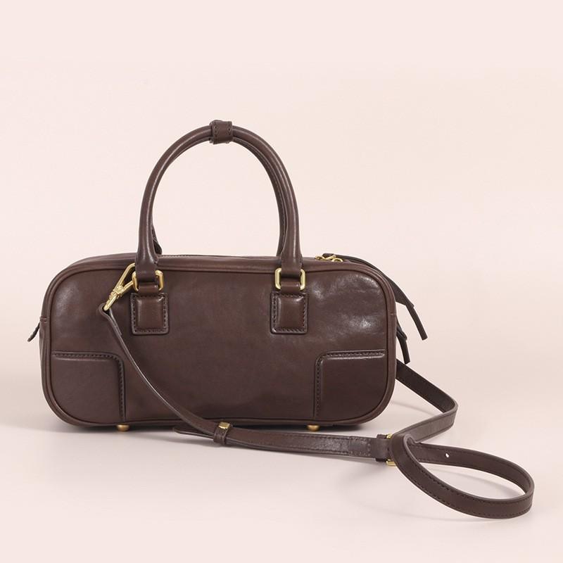 New Vegetable Tanned Leather Pillow Bag Women's Retro Niche Handbag Fashionable High-end Commuter Portable Boston