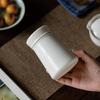 High-End White Porcelain Tea Storage Canister - Exquisite, Sealed, Portable Small Container 
