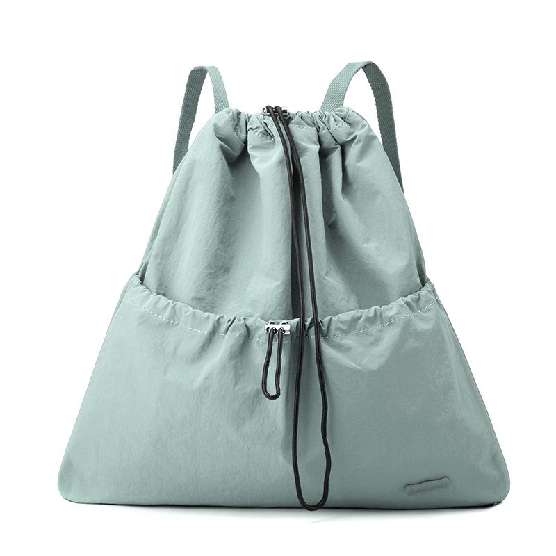 Niche daily leisure lightweight sports drawstring backpack commuter student schoolbag